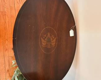 R156 - $125. Tilt Top Table with Eagle Inlay Design. Measures 26" wide x 18" x 28" tall.