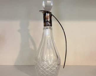 R38 - $30. Silver plated Handle Glass Decanter.