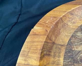 R9 - $65. Dansk. 15.5" round slanted Round Cutting Board. Has chip on edge.