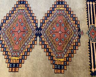R60 - $275. Pakistan Wool Rug. Measures 73" x 50". Beautiful Condition!