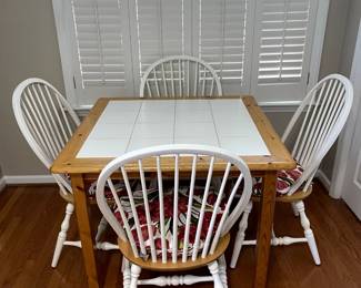 R59 - $125. Breakfast Table with 4 Chairs. Measures 38.5" square x 29.25" tall.