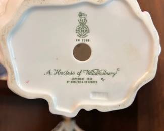 R143 - $20. Royal Doulton "A Hostess of Williamsburg '59" Measures 7" tall.