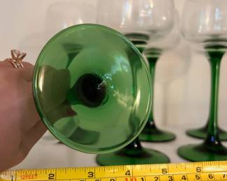 R122 - $25. Set of 6 French Glasses with Emerald Green Stems. Measures 6.5" tall.