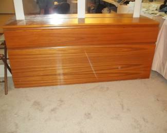 Teak Headboard not scratch something on lens.