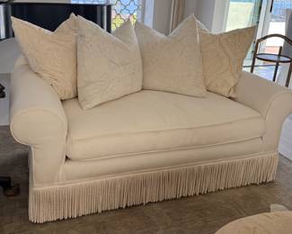 Beautiful cream loveseat with extra slip cover