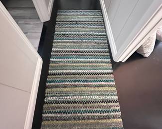 Lots of woven cotton rugs not stained or dirty.