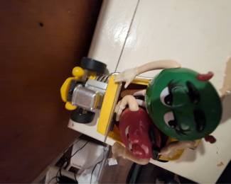 Lot's of M&M toys and some other vintage toys found. unknown what's in the hundreds of closed boxes