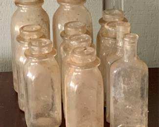 75 - Lot of 9 Glass Bottles