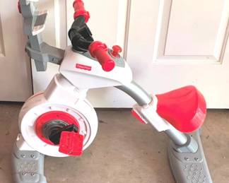 52 - Fisher Price Stationary Bike - 30" x 29" x 14"