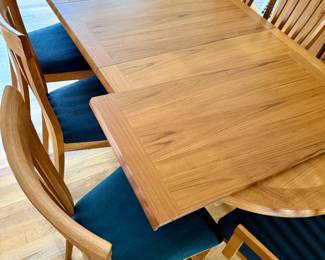high quality large, long dining table with leaf extension to make it even longer! comes with 8 chairs