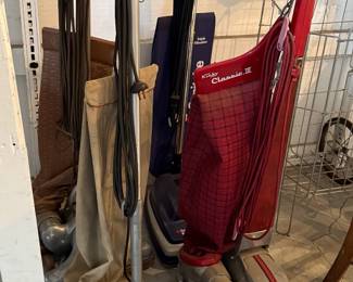 lots of vintage vacuums