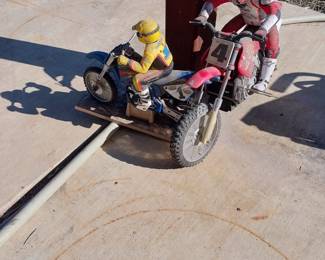 2 toy motorcycle figures