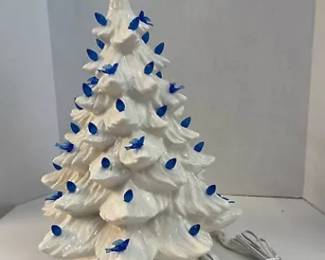 Vintage white ceramic Xmas tree with blue lights and blue birds