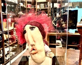Unique pouting woman's head in lucite case