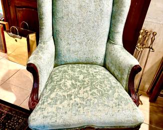 Elegant pair of wingback chairs