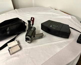 Retro electronics including a Bose wave audio system CD player, JVS Camcorder, and a Sony Walkman