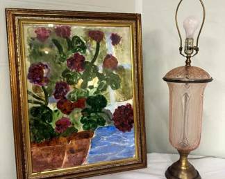 Framed floral painting with Vintage pink glass lamp