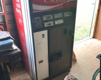 Coke soda machine in outbuilding