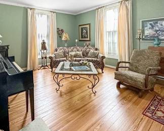 Sofa, rocking chairs, art, floor lamps, piano