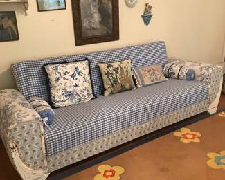 Lovely sofa and wall decor.