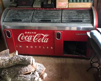 Vintage coke cooler that is full of unopened soda!!!!!
