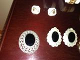 Sterling & Onyx Earrings
14k Diamond & Gold Earrings