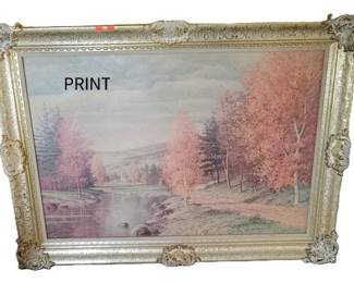 LANDSCAPE PRINT IN GOLD TONE FRAME.