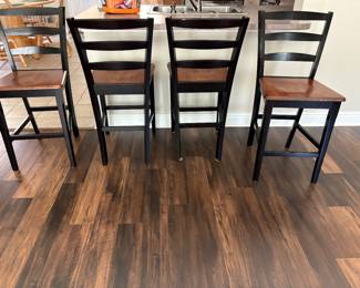Four wooden counter height stools
39” tall
17” deep
18” wide