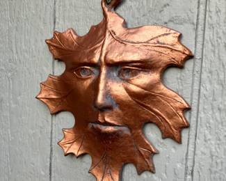 Face on oak leaf