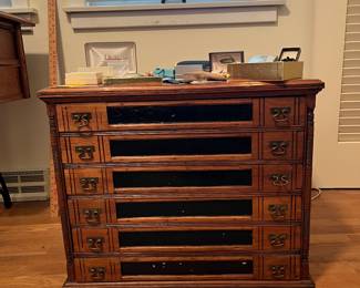 Antique Spool Cabinet. I think it says JP Coats under the paint.