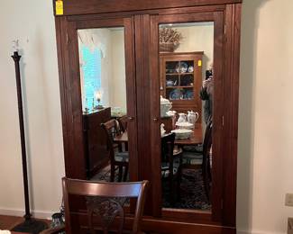 Mirrored Cabinet from Louisiana. Has been retrofitted with shelving.