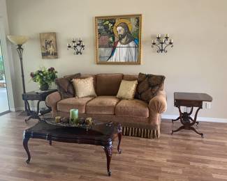 Beautiful brown couch end tables, and coffee table