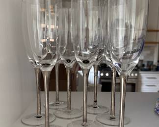 Set of 8 Champagne Flutes with Silver Stems. Photo 1 of 2.
