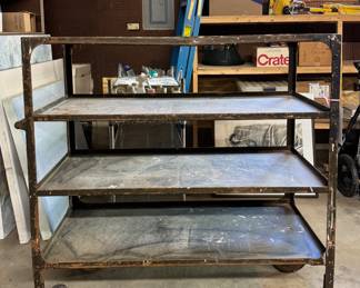 Metal Industrial Storage 4-Shelf Rolling Storage Rack.