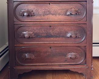 Eastlake Victorian Three-Drawer Chest of Drawers. Measures 32" W x 17" D x 31" H. Photo 1 of 4.