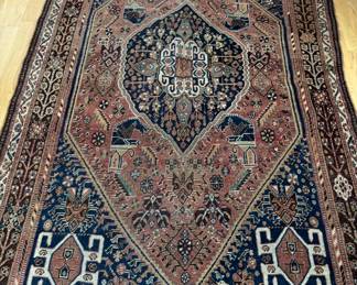 Antique Shiraz Rug. Measures 5'2" x 8'2". Photo 1 of 2.