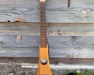 26 TheBackpackerGuitarwBlackSheerCaringCase