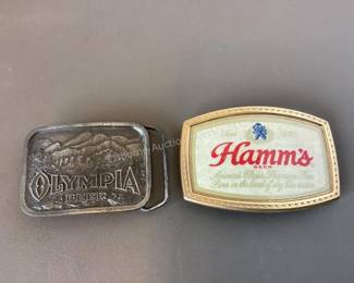Olympia & Hamm's belt buckles