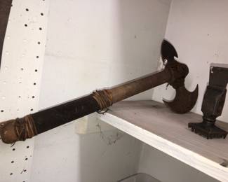 Hatchet. Second tool is an antique kitchen hammer.