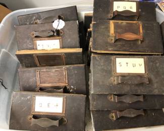 Drawer fronts of antique card files.  Hardware, pulls and frames are copper.  Sold by the piece.  