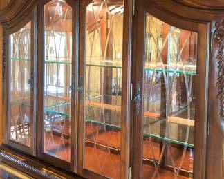SOLD Detail pic, side view
Havertys China Cabinet SOLD
-beveled glass doors, lighted
Measures 69x19x89