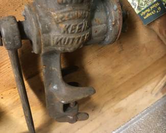 Keen Kutter Close up of Iron meat grinder, wood handle