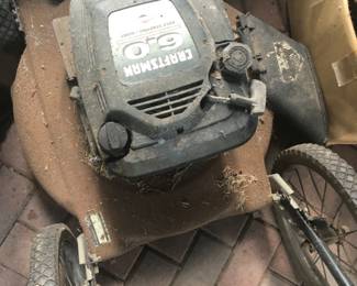 Craftsman high wheel lawn mower.  It wants to start!