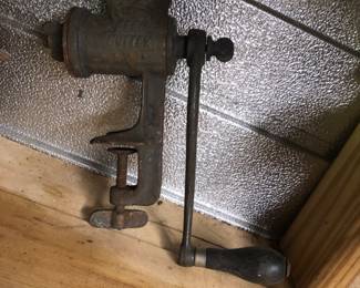 Close up of Iron meat grinder, wood handle