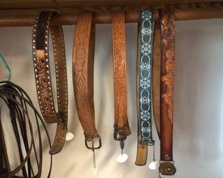 Hand tooled leather belts.