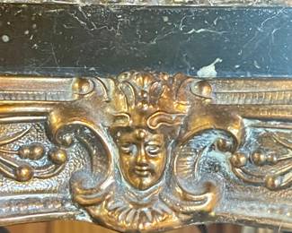 Detail pic, figural ornate brass face
MCM Hollywood Regency Ormolu lamp with marble base and original shade