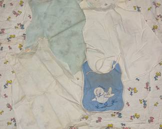 Antique 1920-1930s children's clothing
- Hand-sewn Blue, Baby Bird embroidered Bib
- Antique Cotton baby dresses and slips adorned with French knot embroidery, pin-tucked details, tiny mop buttons.