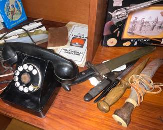 1950s Telephone Model 302 made of Bakelite and designed by Henry Dreyfuss
Various Buck Knives