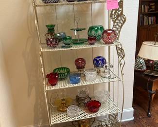 Lots of nice Crystal rose bowls and wrought iron backers rack