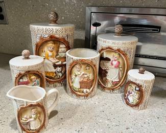 1970'S PIONEER WOMAN CANISTER SET 8 PIECE.